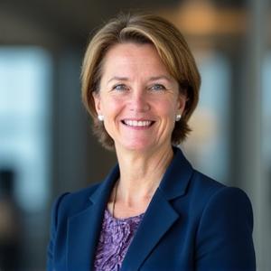 Emma Thompson, Lead Change Architect, smiling professionally.